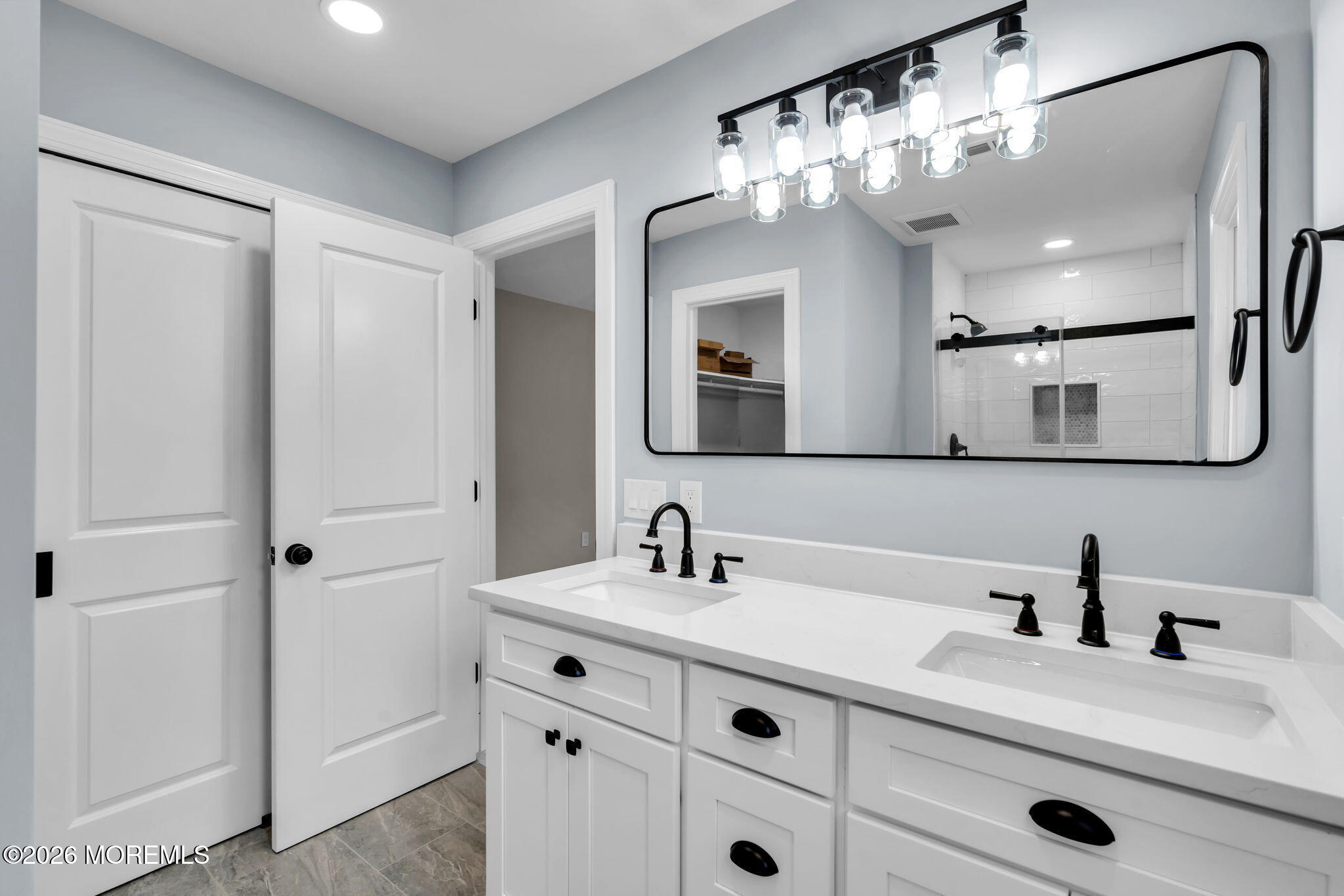 17 Meadowbrook Road Brick, NJ 08723 - Photo 23 of 36 a bathroom with a sink a double vanity and a mirror
