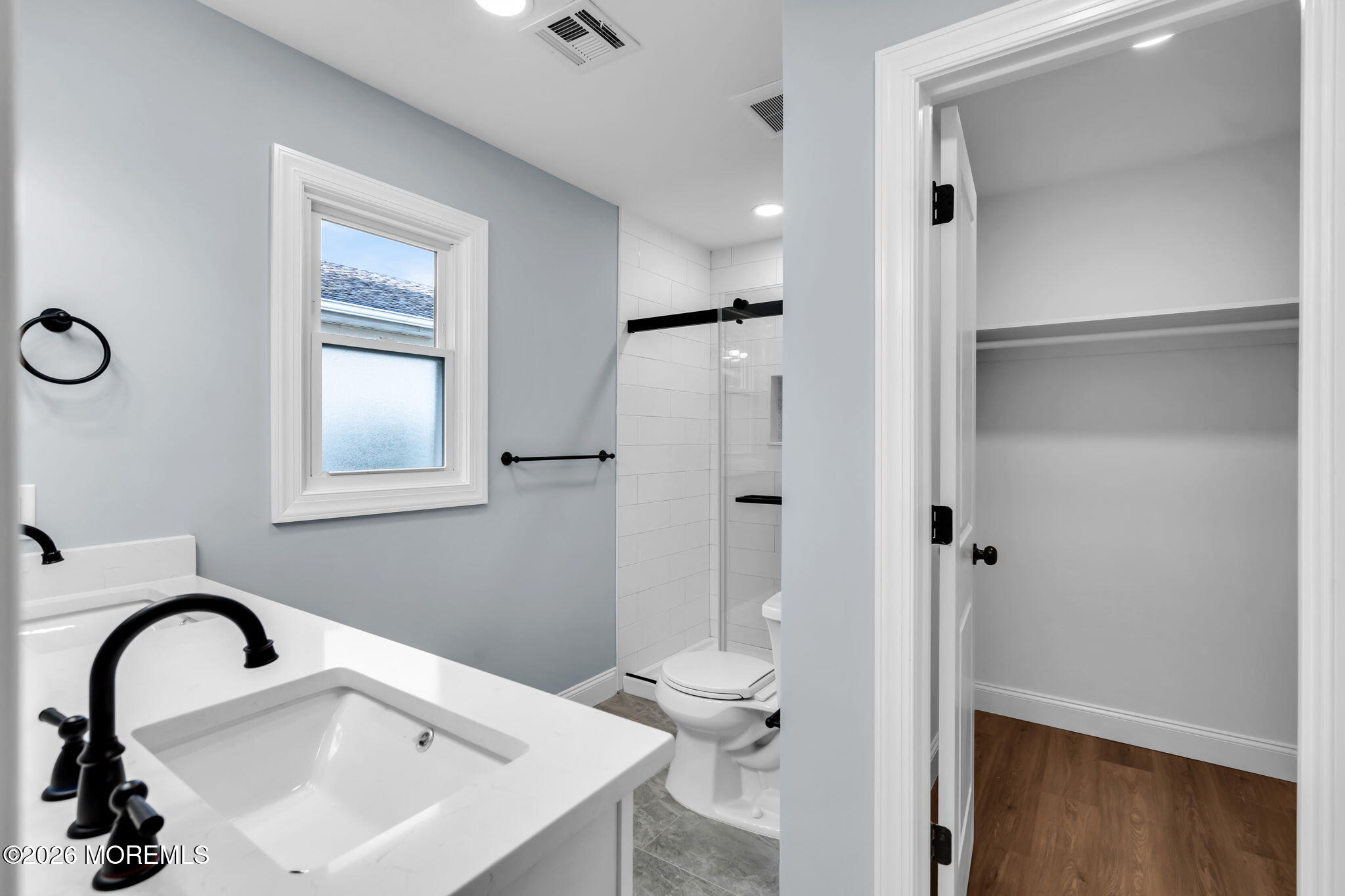 17 Meadowbrook Road Brick, NJ 08723 - Photo 25 of 36 a bathroom with a sink and mirror