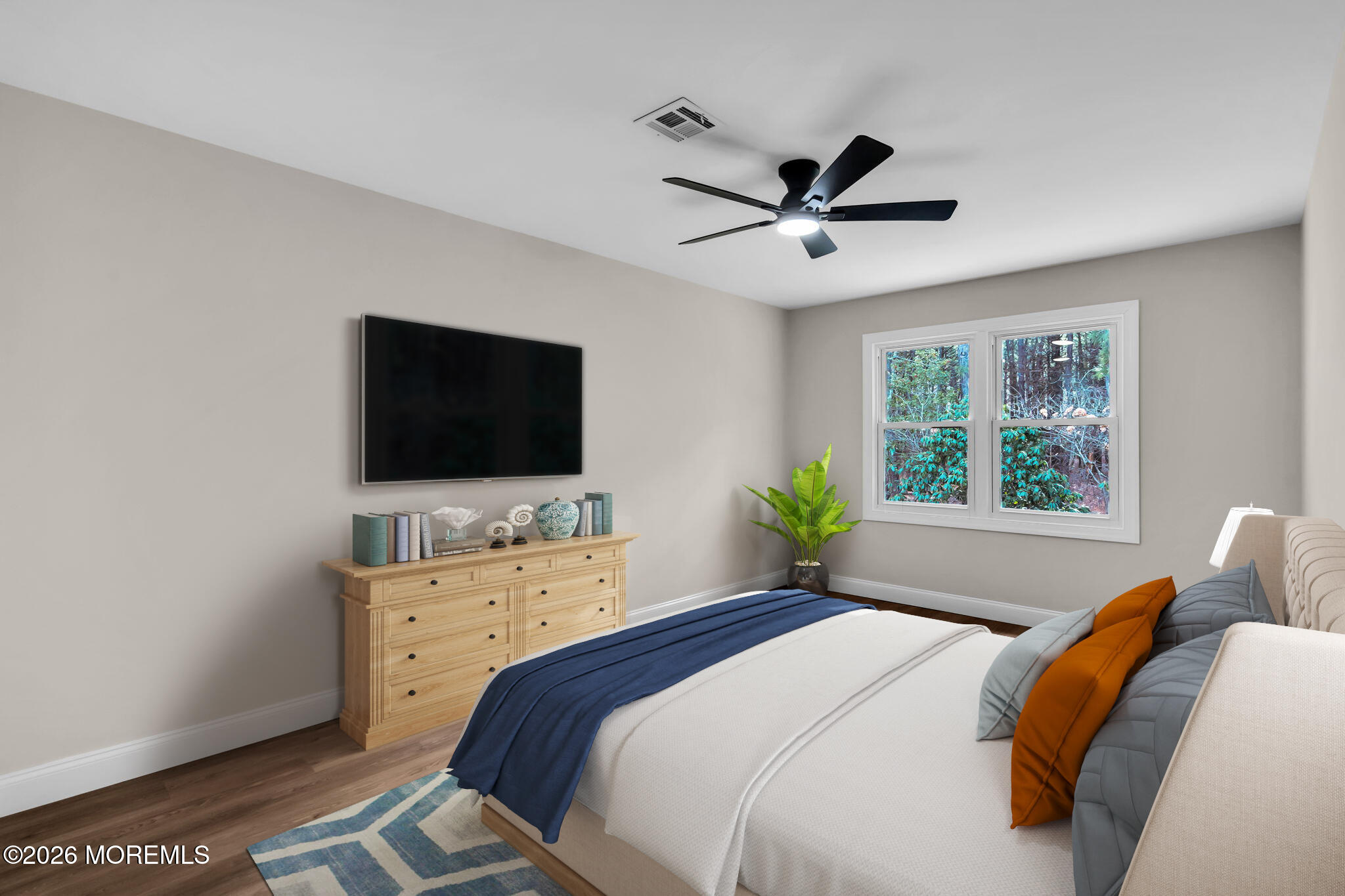 17 Meadowbrook Road Brick, NJ 08723 - Photo 29 of 36 a bedroom with a bed and a flat screen tv