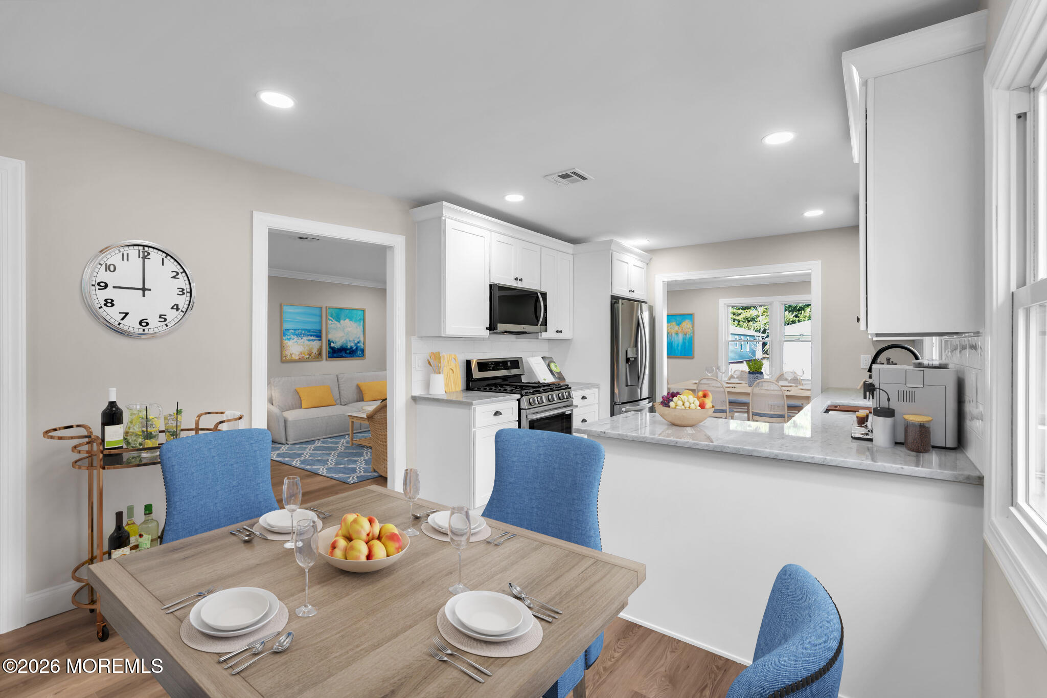 17 Meadowbrook Road Brick, NJ 08723 - Photo 5 of 36 a kitchen with a dining table and chairs