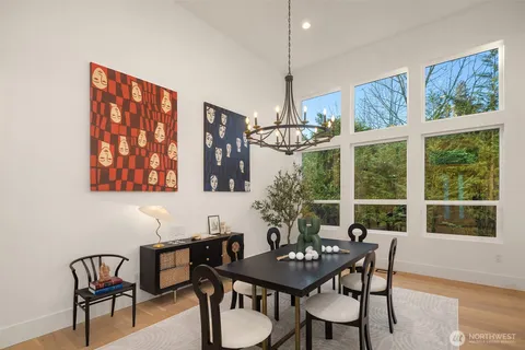 a view of a dining room with furniture window and outside view