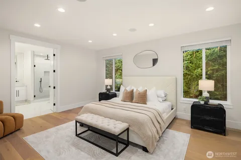 a bedroom with bed and a couch