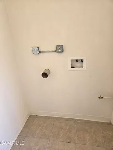 a house with trees in the background