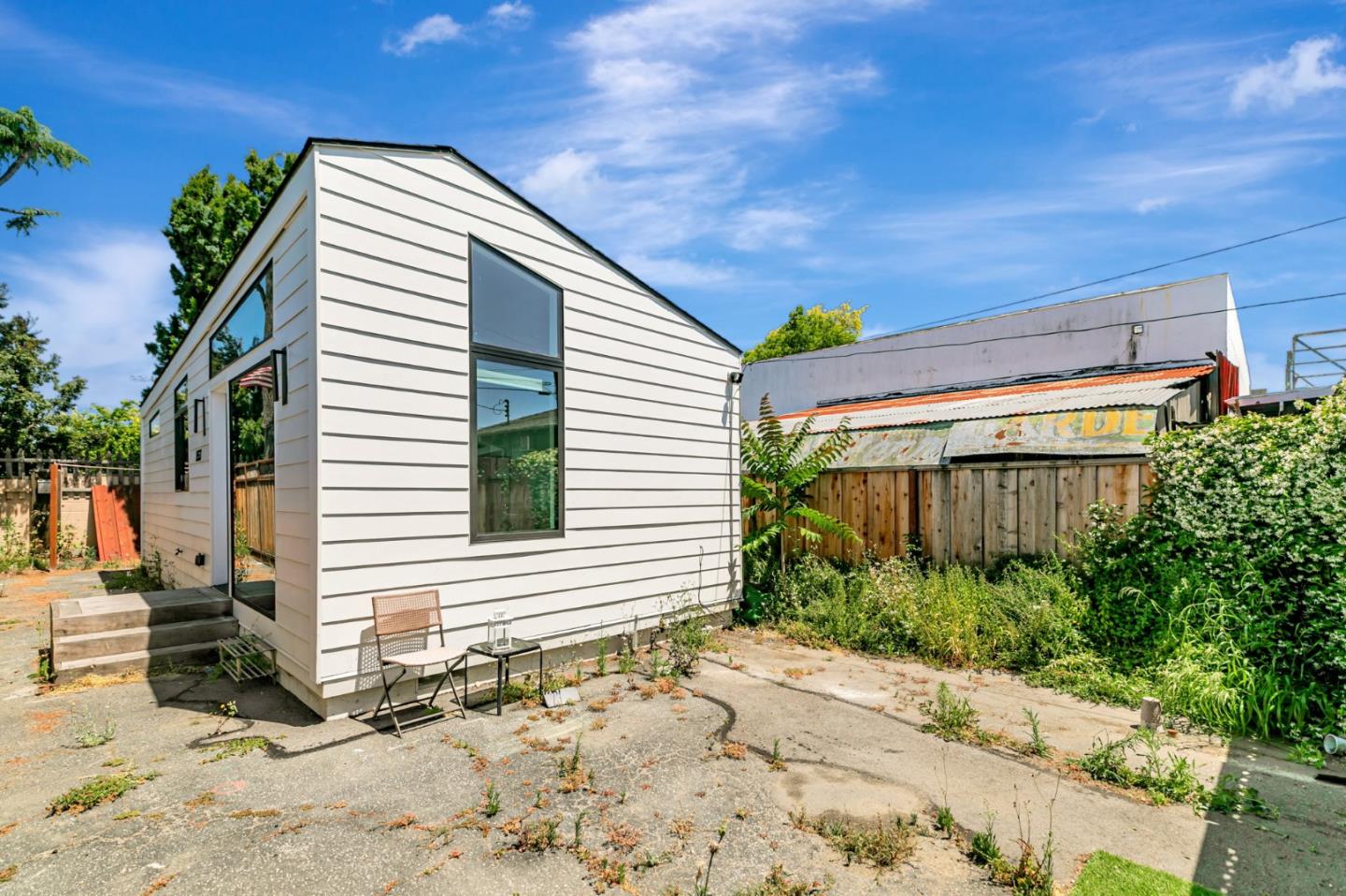 1555 Washington Street Santa Clara, CA 95050 - Photo 6 of 19 a view of a house with a yard and sitting area