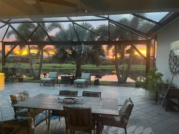a outdoor dining space with furniture and outdoor view