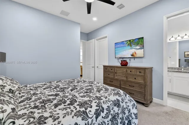 a utility room with sink dryer and washer