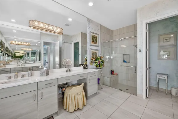 a utility room with sink dryer and washer