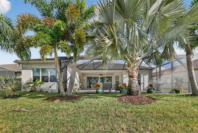 a view of a swimming pool with a table and chairs