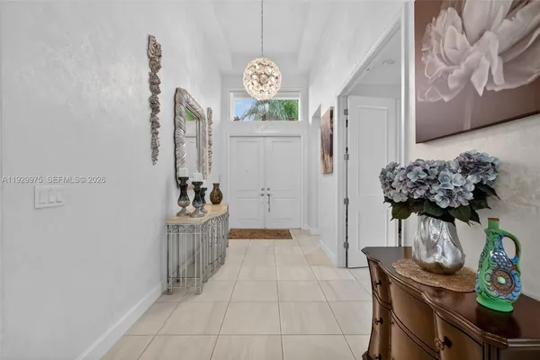 a dining room filled with furniture and window