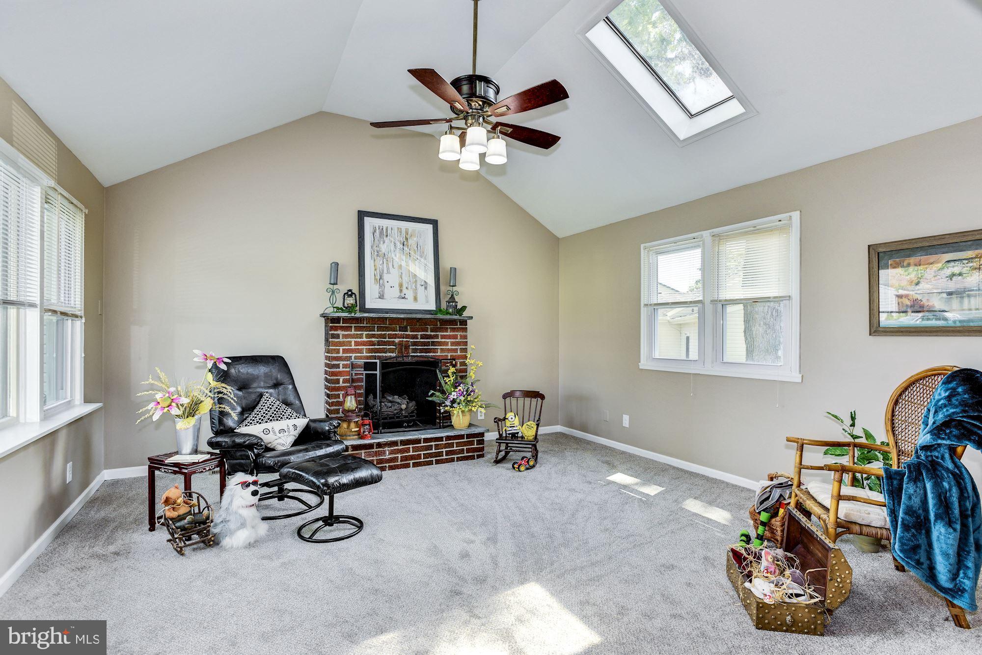 19 Randolph Road West Deptford, NJ 08096 - Photo 12 of 30 Family Room: Gas FP, skylights , carpeted.