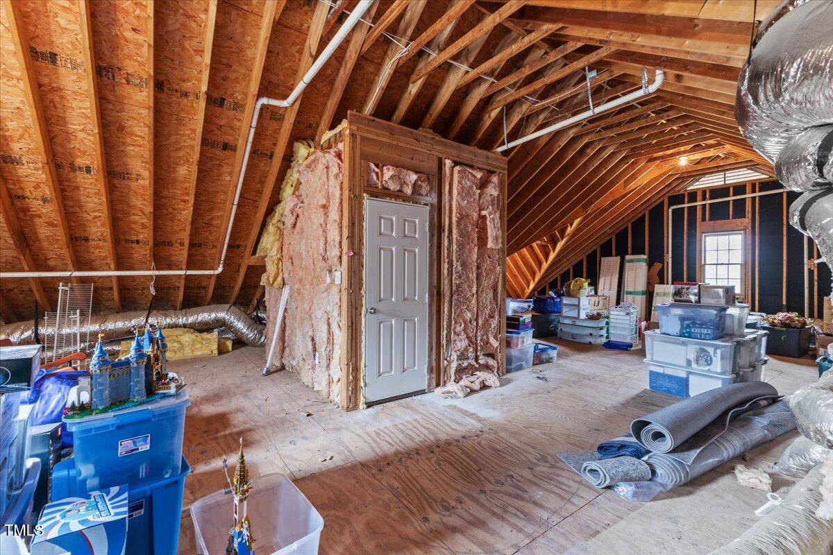 6116 Wilkinsburg Road Raleigh, NC 27612 - Photo 52 of 65 a view of outdoor space with porch and wooden floor