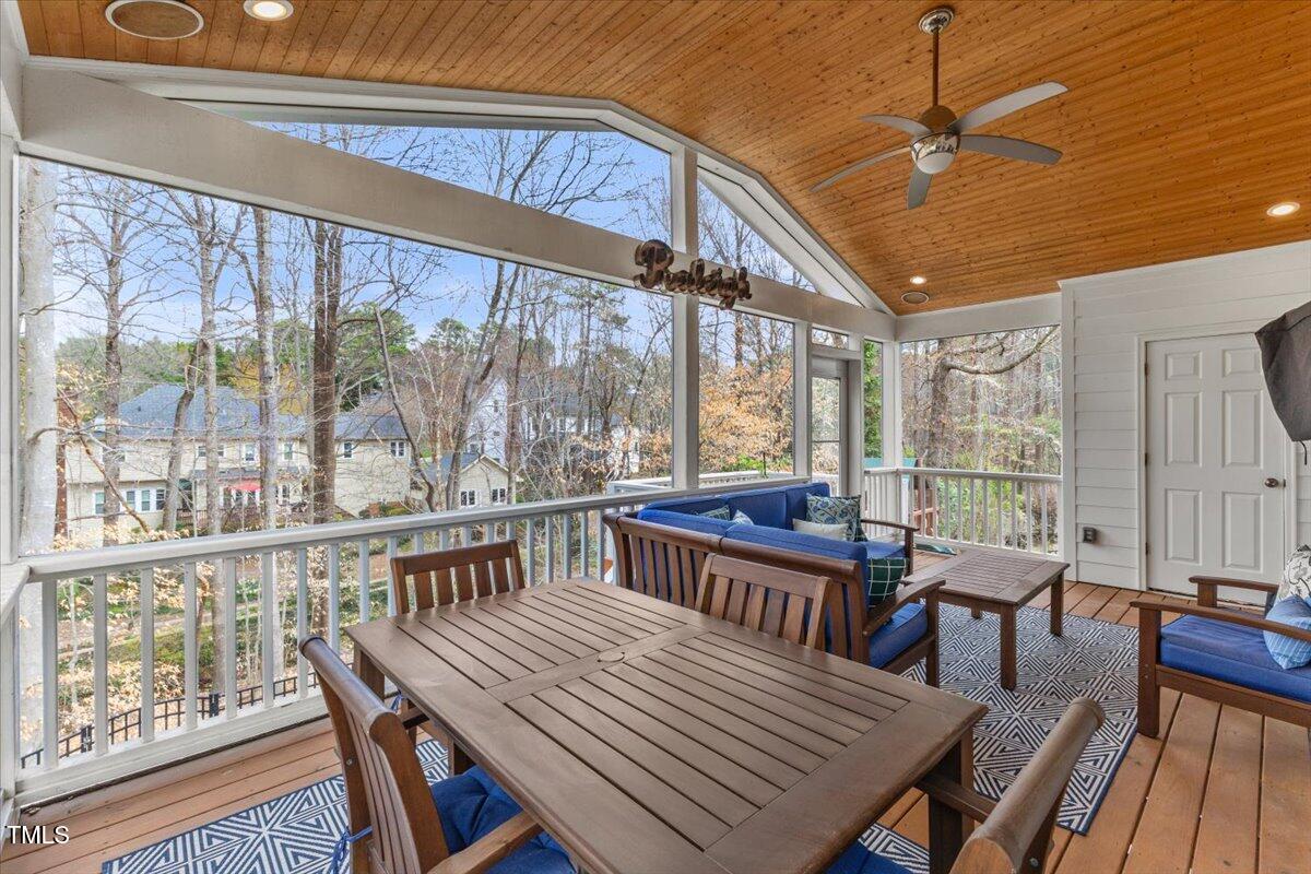 6116 Wilkinsburg Road Raleigh, NC 27612 - Photo 55 of 65 a view of a dining room with furniture window and outside view