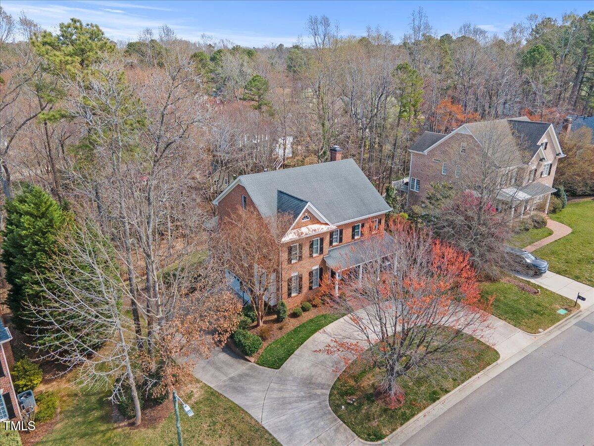 6116 Wilkinsburg Road Raleigh, NC 27612 - Photo 63 of 65 an aerial view of a house with a mountain