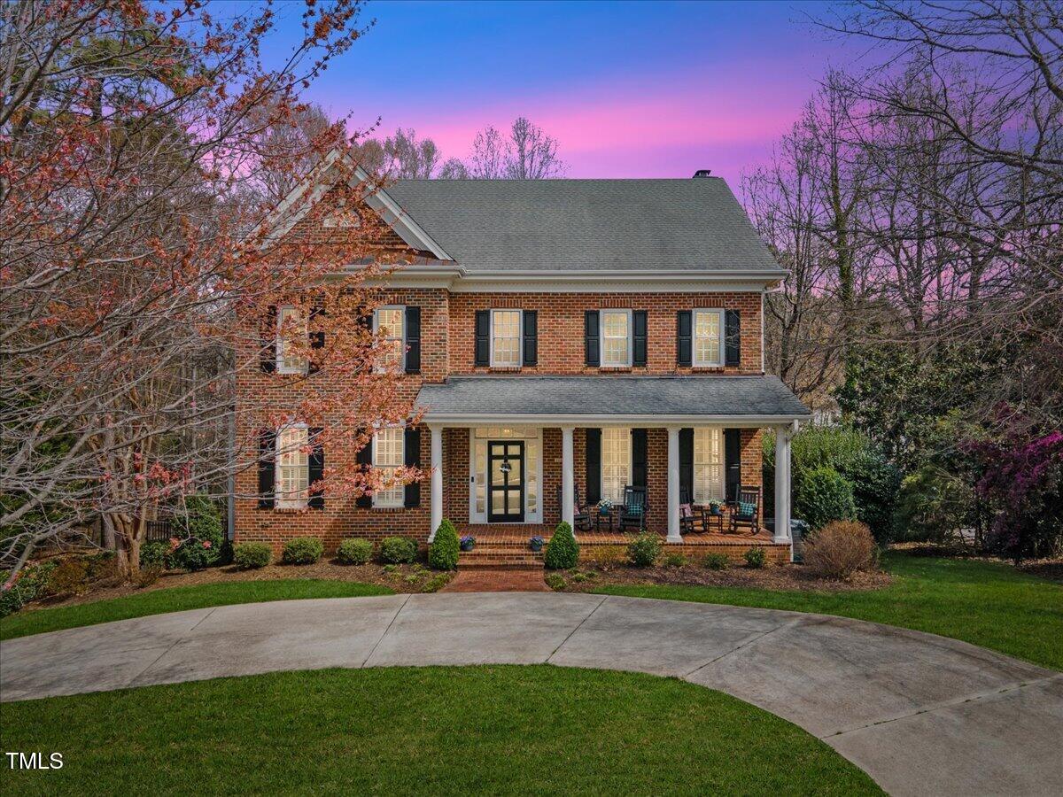 6116 Wilkinsburg Road Raleigh, NC 27612 - Photo 65 of 65 a front view of a house with a yard
