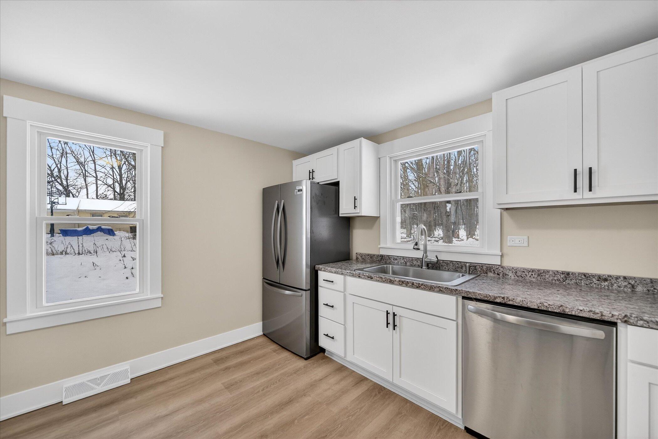 2370 Raby Road East Lansing, MI 48823 - Photo 8 of 21 10-2370 Raby Rd-WindowStill-Photography