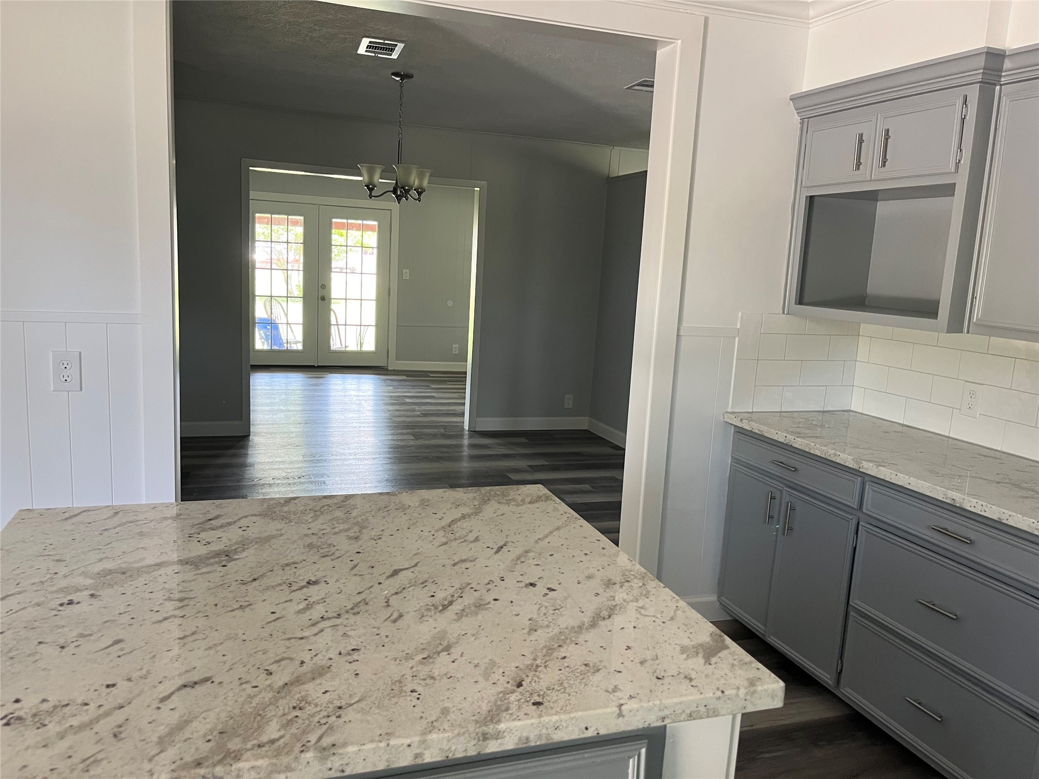 1320 Montezuma Street Columbus, TX 78934 - Photo 12 of 20 a view of a kitchen cabinets and a wooden floor