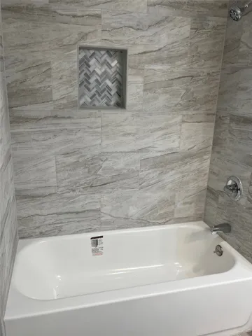 a bathroom with a bathtub