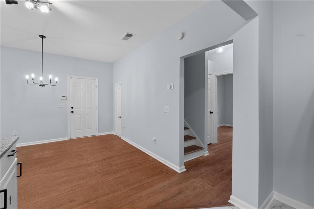 49 Harlan Road Southwest Atlanta, GA 30311 - Photo 11 of 38 a view of empty room with wooden floor
