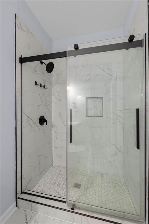 49 Harlan Road Southwest Atlanta, GA 30311 - Photo 16 of 38 a bathroom with a shower