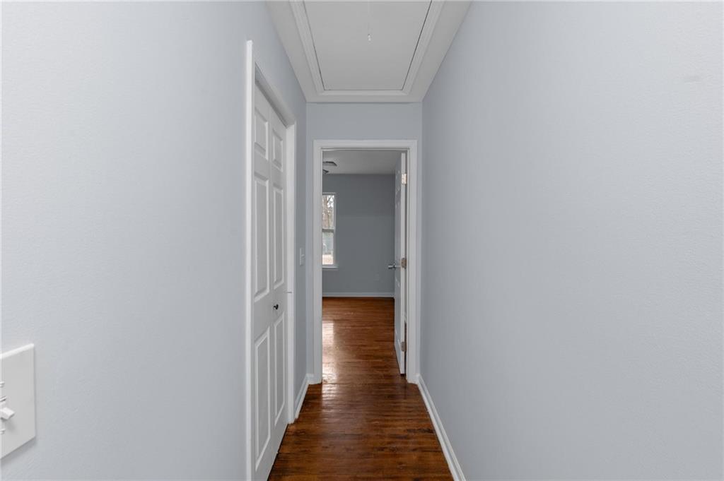 49 Harlan Road Southwest Atlanta, GA 30311 - Photo 27 of 38 a view of a hallway with wooden floor and closet