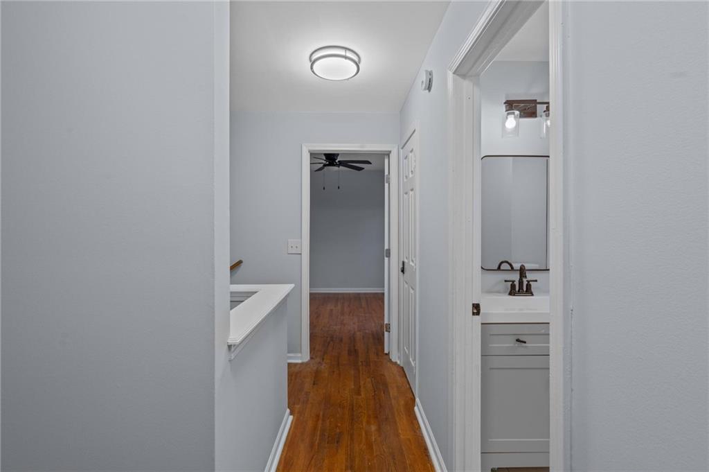 49 Harlan Road Southwest Atlanta, GA 30311 - Photo 28 of 38 a view of a hallway with wooden floor and closet