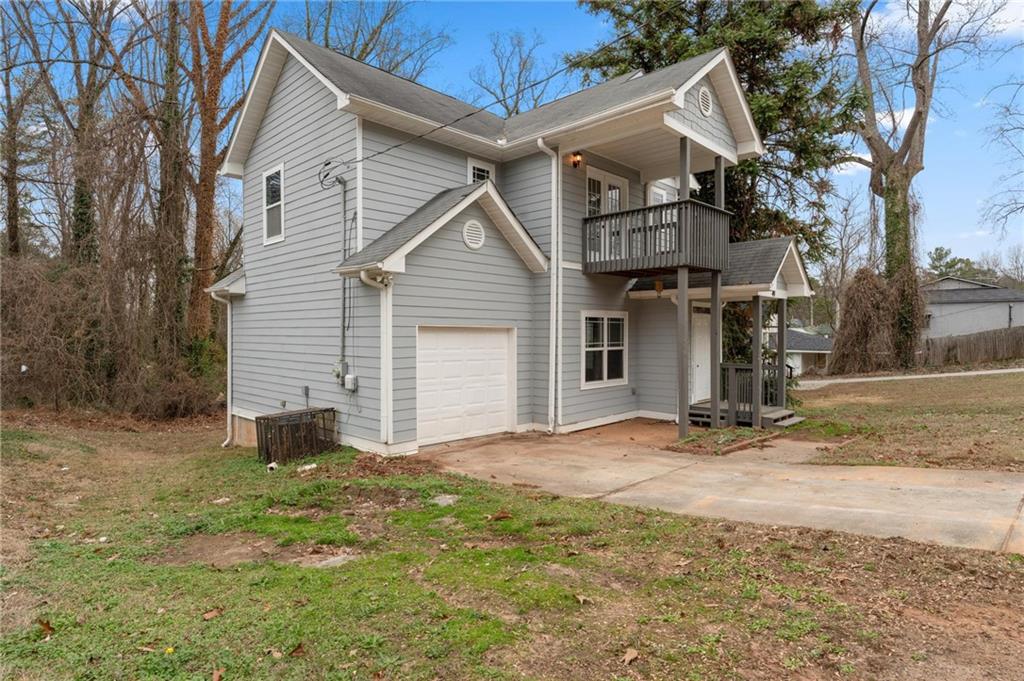 49 Harlan Road Southwest Atlanta, GA 30311 - Photo 38 of 38 a view of a house with a yard
