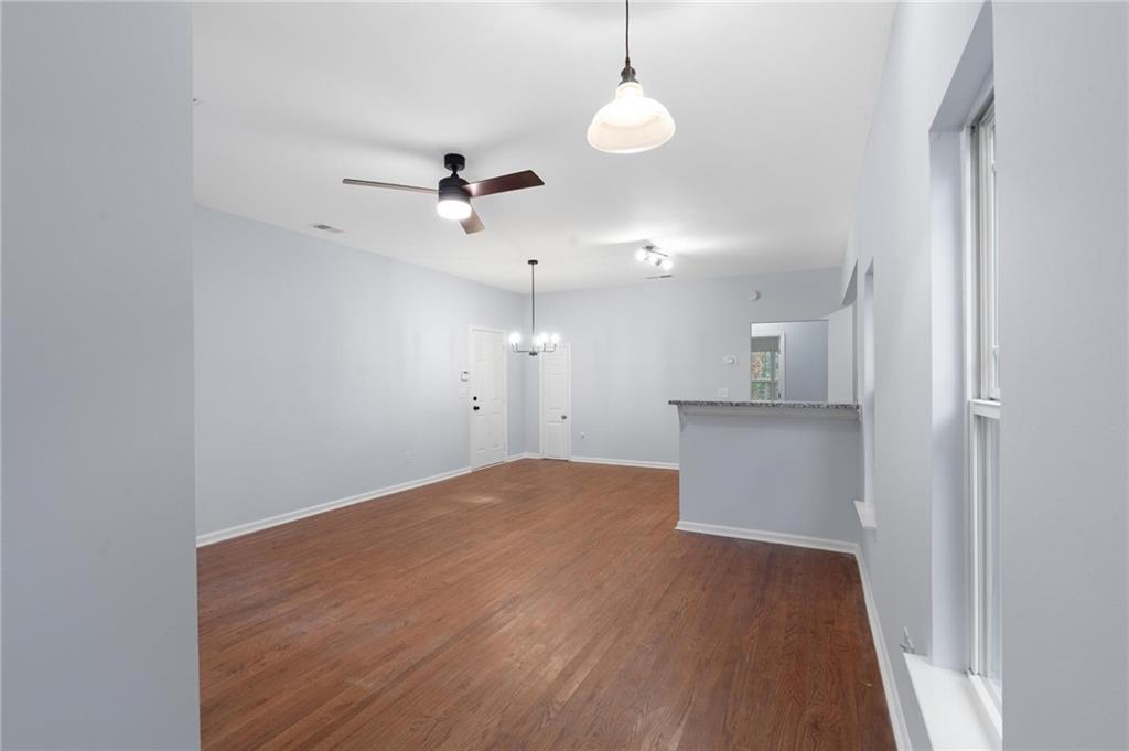 49 Harlan Road Southwest Atlanta, GA 30311 - Photo 5 of 38 a view of empty room with wooden floor