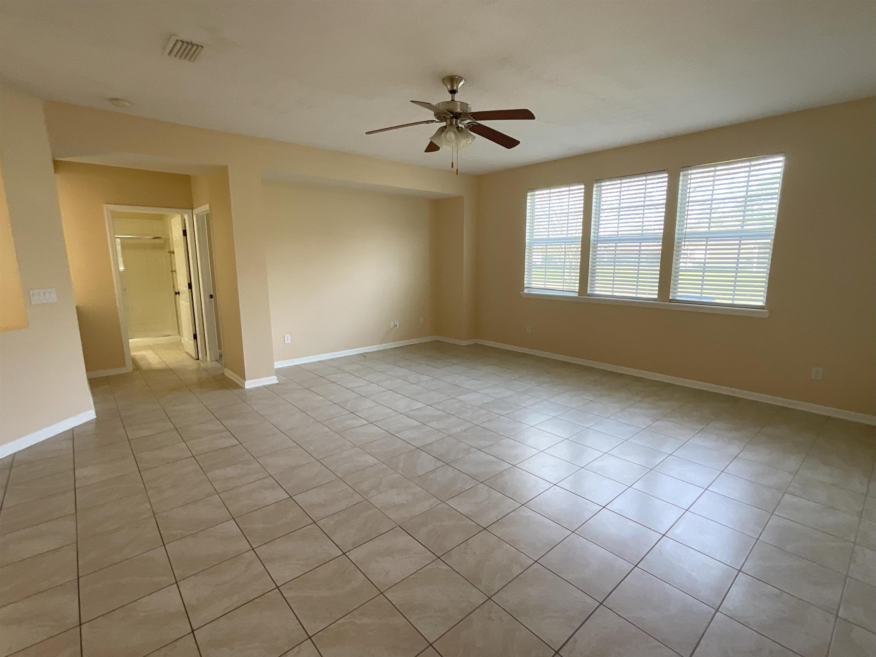 133 Camden Cay Drive St. Augustine, FL 32086 - Photo 11 of 33 a view of an empty room with a window