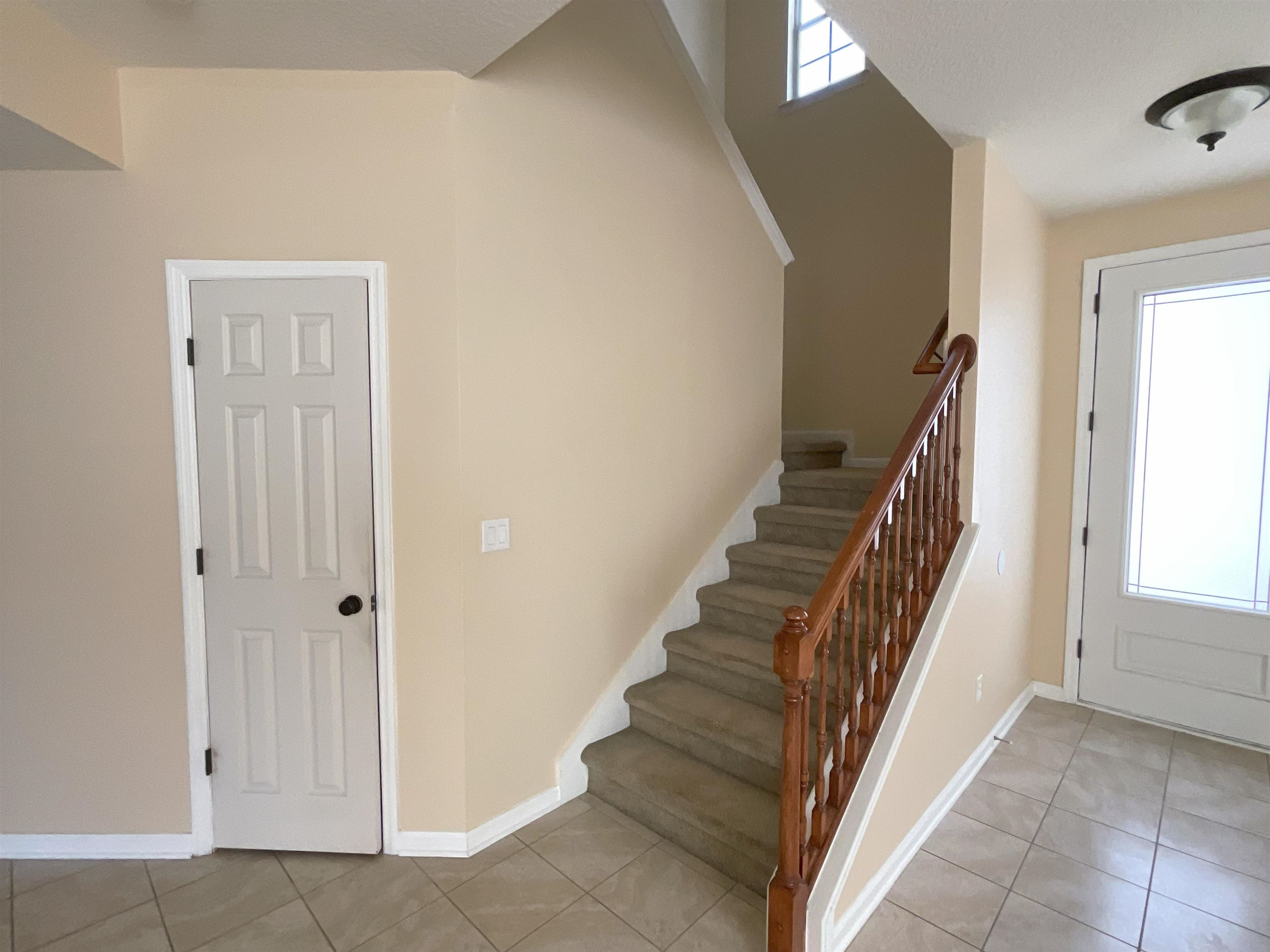 133 Camden Cay Drive St. Augustine, FL 32086 - Photo 12 of 33 a view of a hallway with staircase