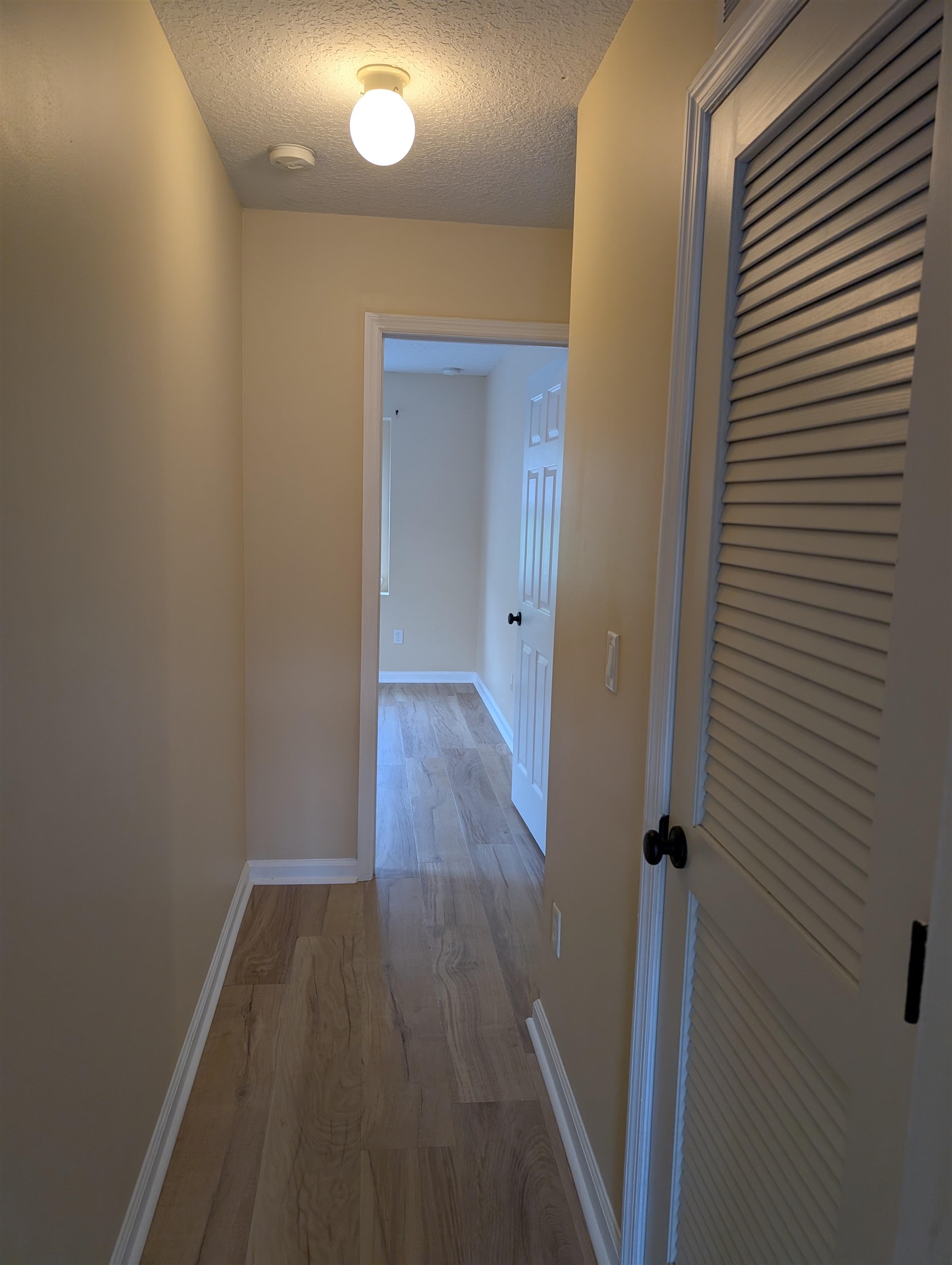 133 Camden Cay Drive St. Augustine, FL 32086 - Photo 17 of 33 a view of a hallway with wooden floor