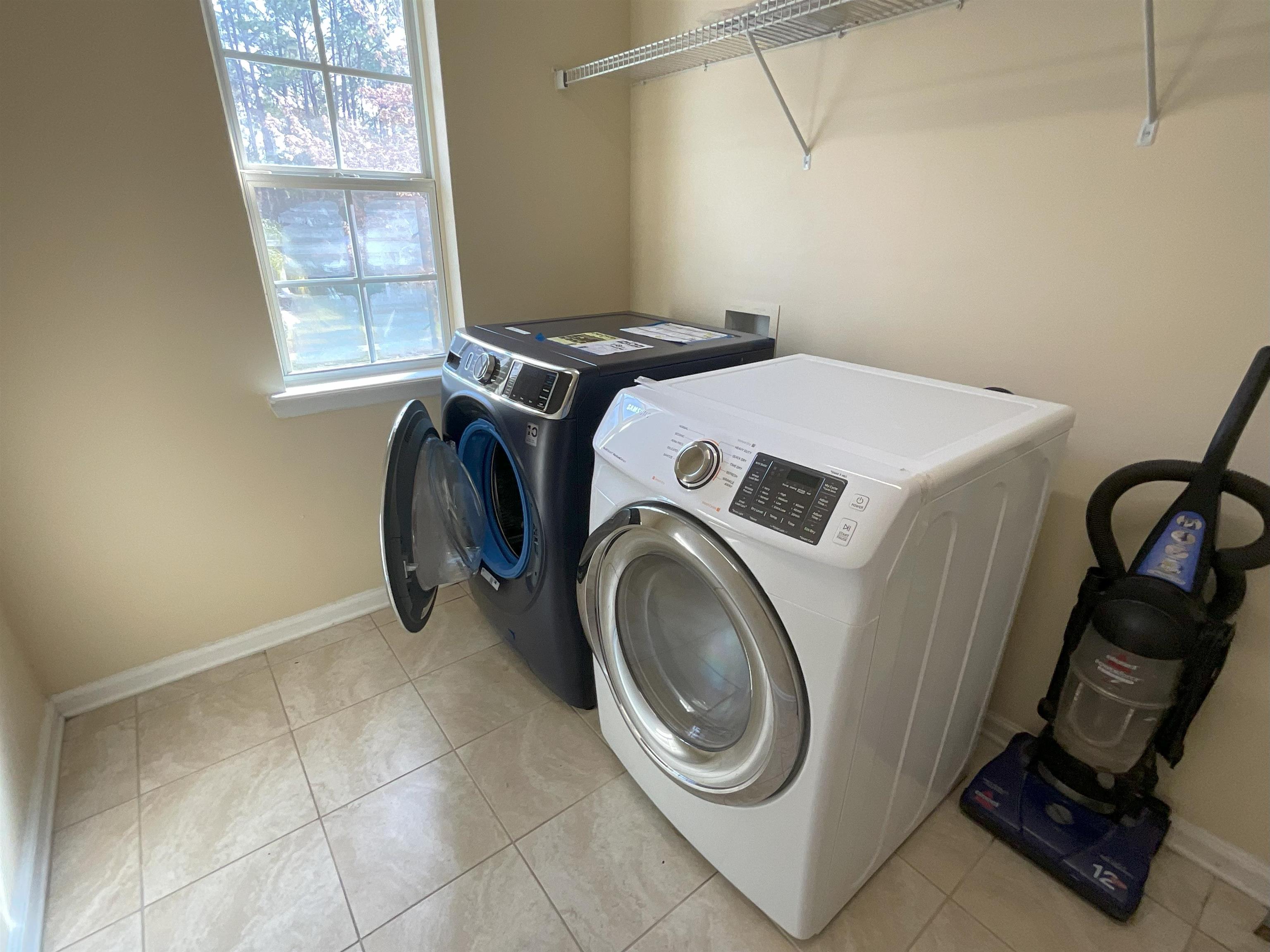 133 Camden Cay Drive St. Augustine, FL 32086 - Photo 22 of 33 a utility room with dryer and washer
