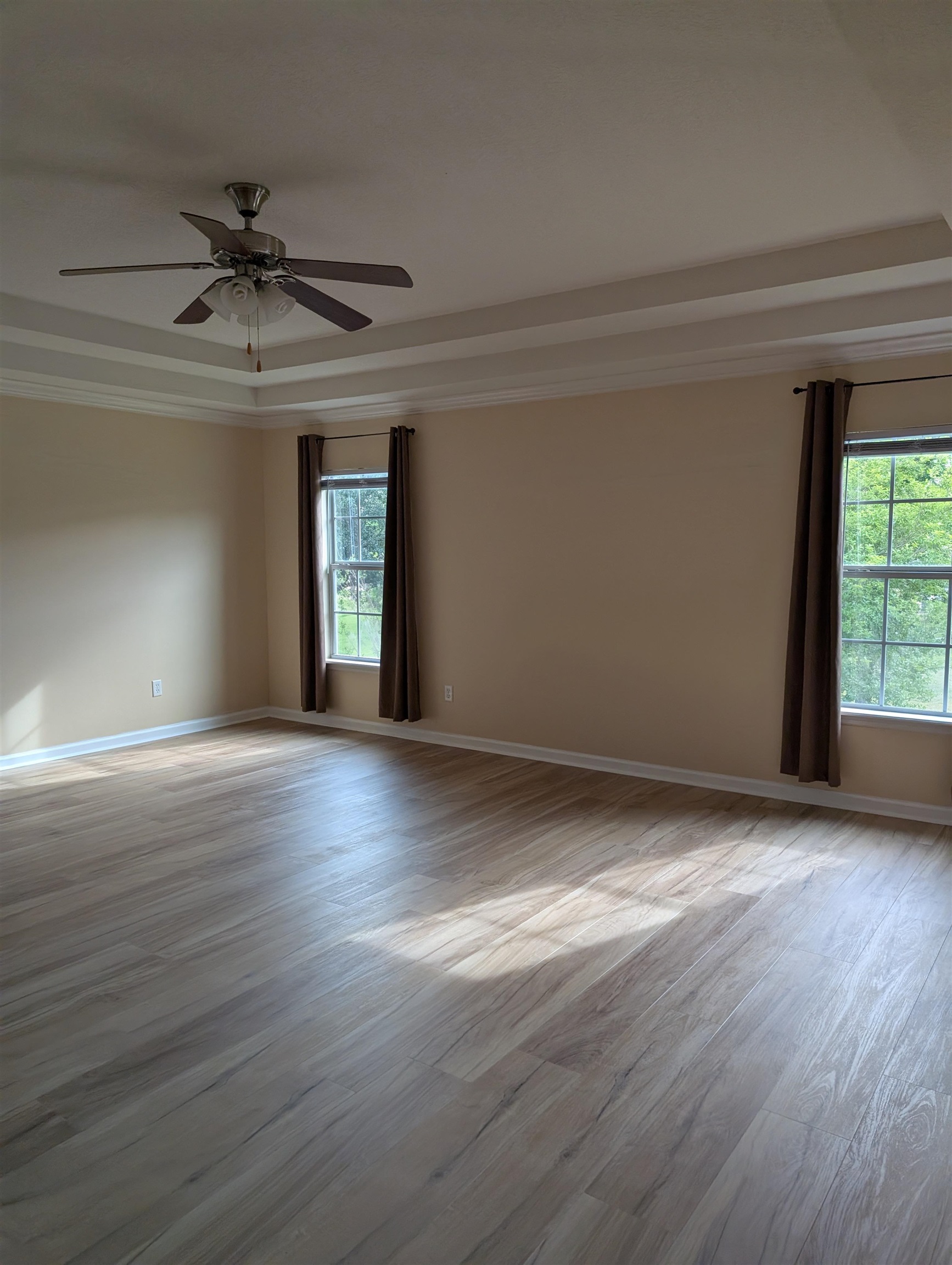 133 Camden Cay Drive St. Augustine, FL 32086 - Photo 25 of 33 a view of an empty room with wooden floor and a window