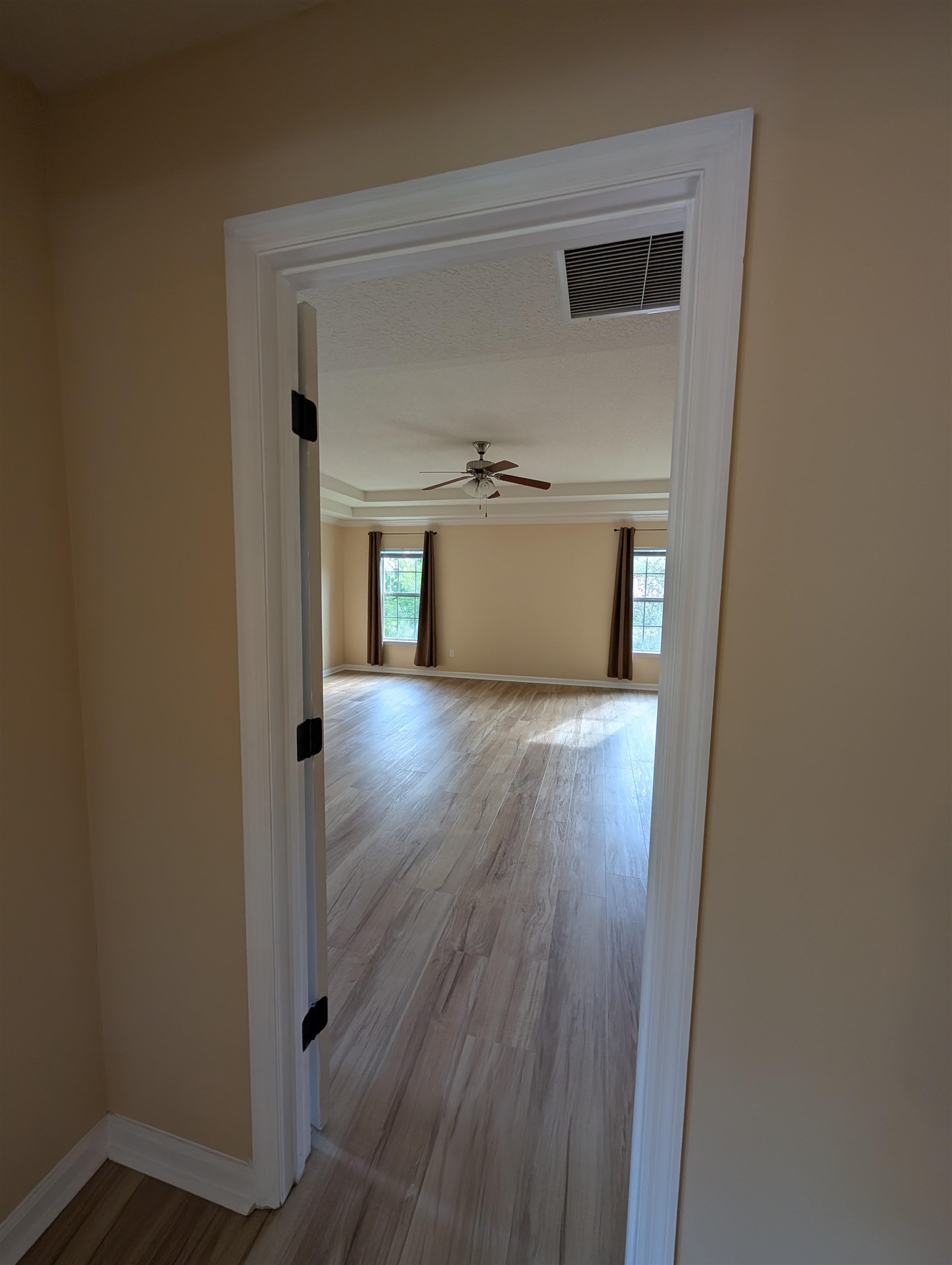 133 Camden Cay Drive St. Augustine, FL 32086 - Photo 27 of 33 a view of a hallway with wooden floor