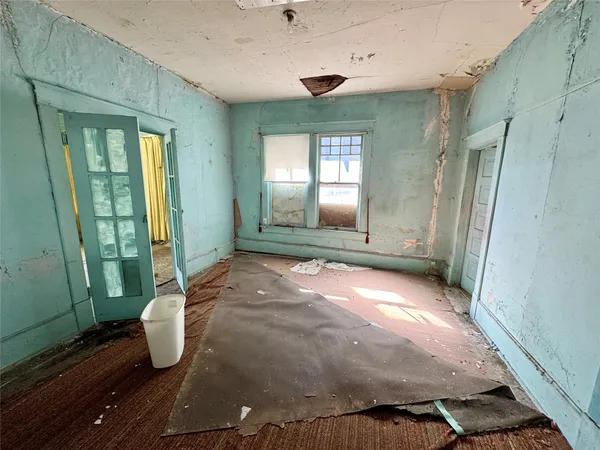an empty room with windows