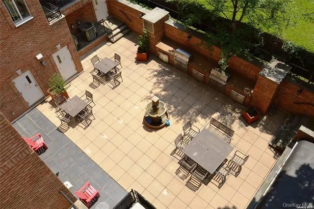 a view of a terrace with sitting area