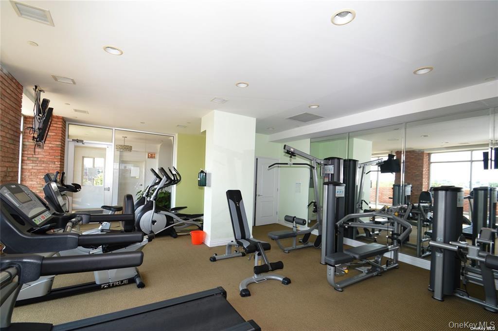 69-14 41st Avenue, Unit 401 Queens, NY 11377 - Photo 17 of 19 a view of a room with gym equipment