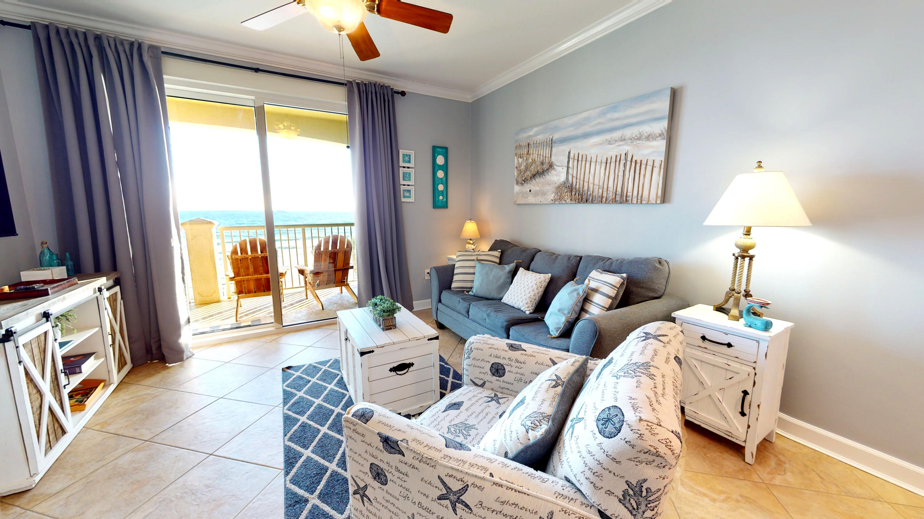 11807 Front Beach Road, Unit 1402 Panama City Beach, FL 32407 - Photo 11 of 37 a living room with furniture and a window