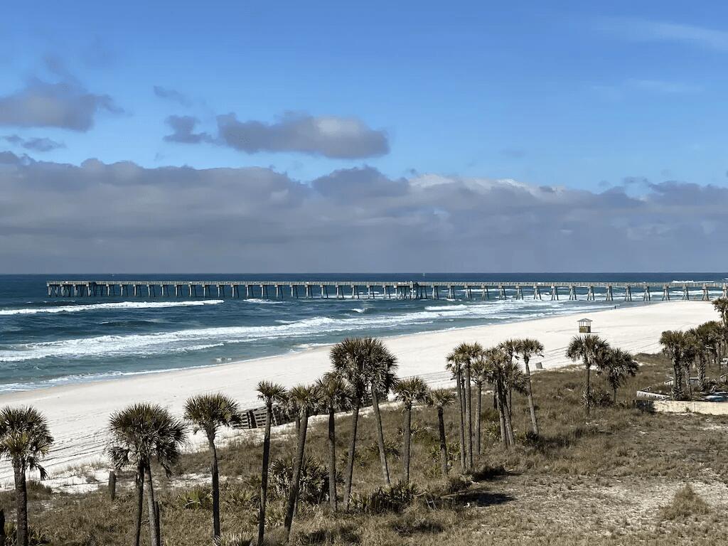 11807 Front Beach Road, Unit 1402 Panama City Beach, FL 32407 - Photo 30 of 37 a view of a lake with a mountain in the background