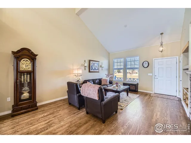 a kitchen with sink stove and cabinets