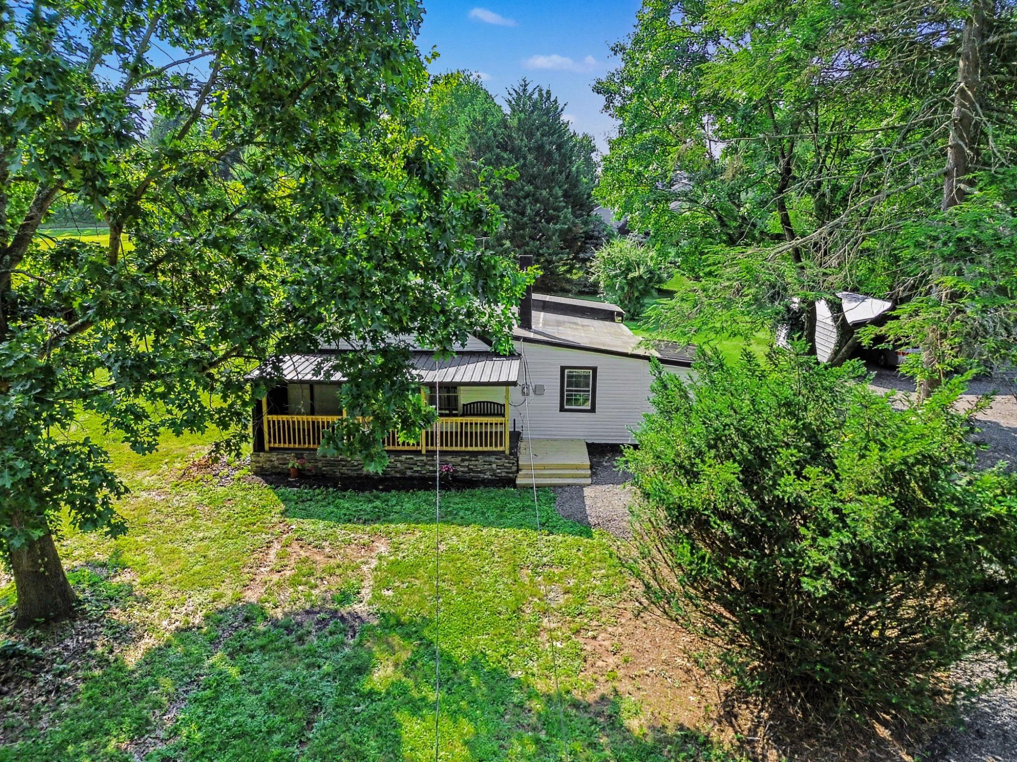 1041 Rohlers Church Road Dover, PA 17315 - Photo 27 of 33 Charming home nestled in lush greenery.
