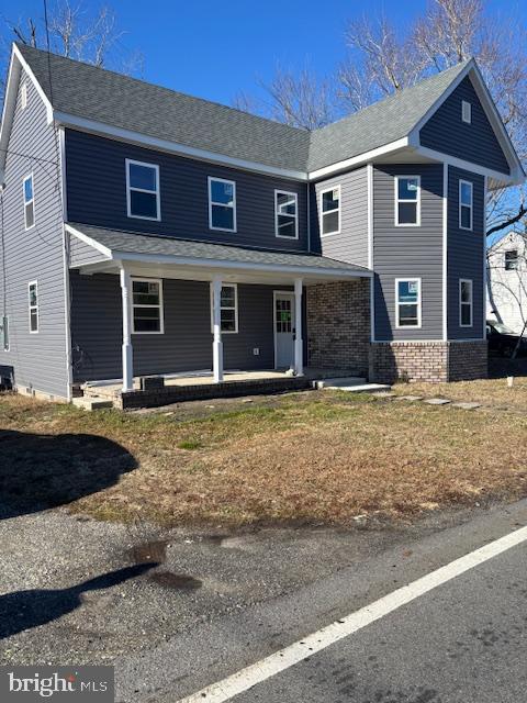 5026 Bethlehem Road Preston, MD 21655 - Photo 2 of 2 a front view of a house with garden
