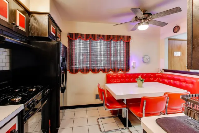 a room with furniture and a flat screen tv