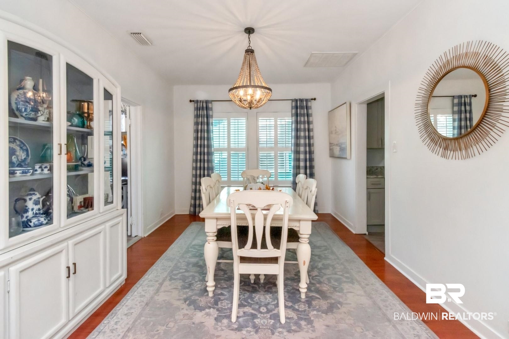 116 Item Avenue Mobile, AL 36607 - Photo 9 of 33 Dining room with hardwood / wood-style flooring and an inviting chandelier