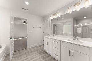 660 Bald Ridge Circle Demorest, GA 30535 - Photo 18 of 24 a bathroom with a double vanity sink mirror and shower