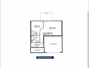 a picture of a bench in front of a wall