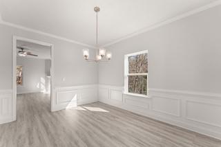 660 Bald Ridge Circle Demorest, GA 30535 - Photo 3 of 24 a view of empty room with wooden floor and window
