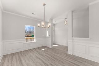 660 Bald Ridge Circle Demorest, GA 30535 - Photo 4 of 24 a view of empty room with wooden floor and window