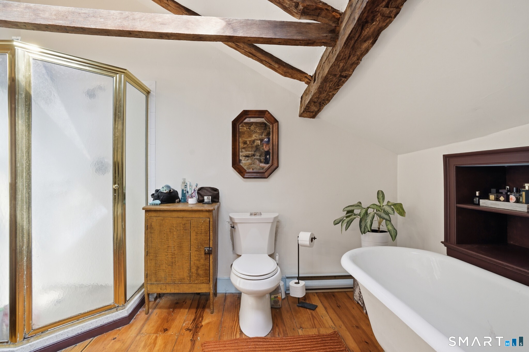 604 Pendleton Hill Road North Stonington, CT 06359 - Photo 34 of 39 a bathroom with a toilet a sink and a bathtub