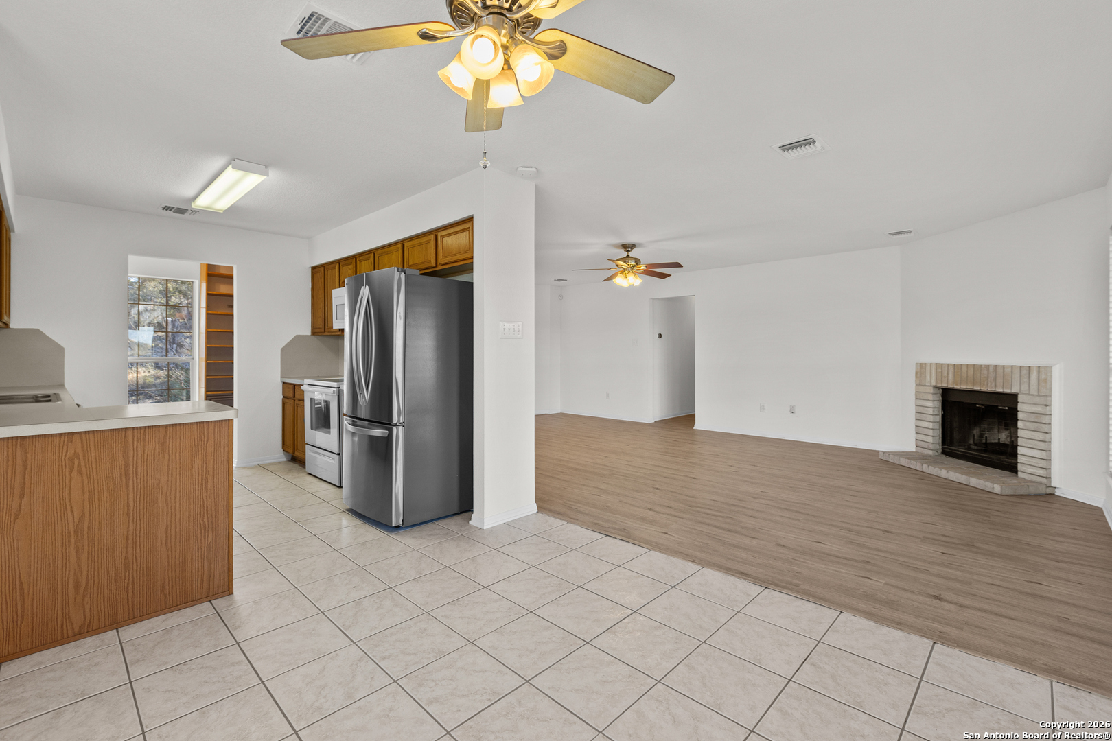 431 Windy Hill Drive Spring Branch, TX 78070 - Photo 13 of 45 a view of a kitchen with furniture and stainless steel appliances