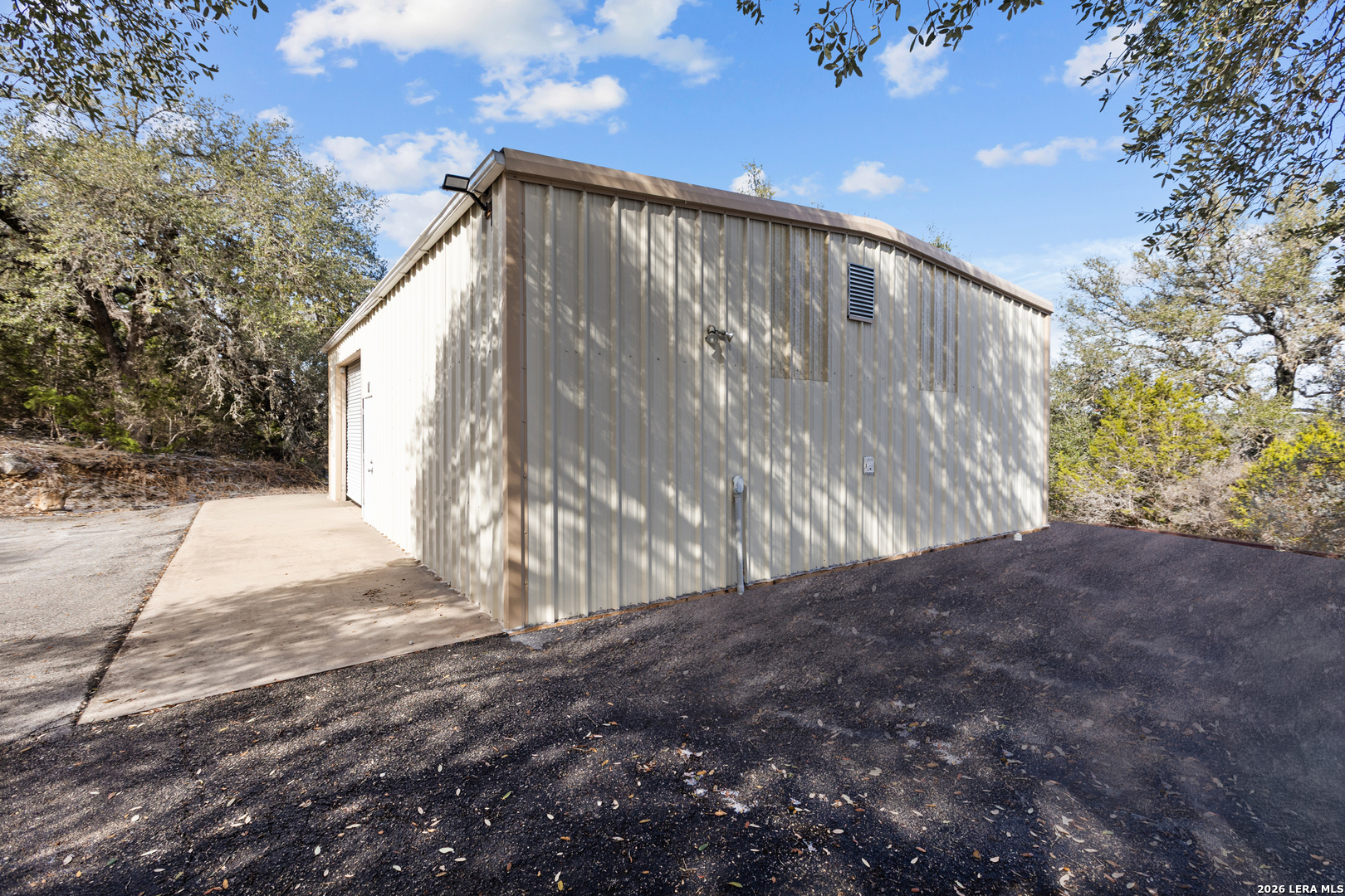 431 Windy Hill Drive Spring Branch, TX 78070 - Photo 33 of 45 a view of backyard and tree